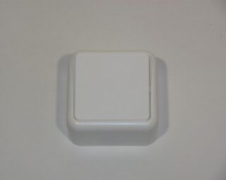 Выключатель одноклавишный белый, накладной 10А, 250В.